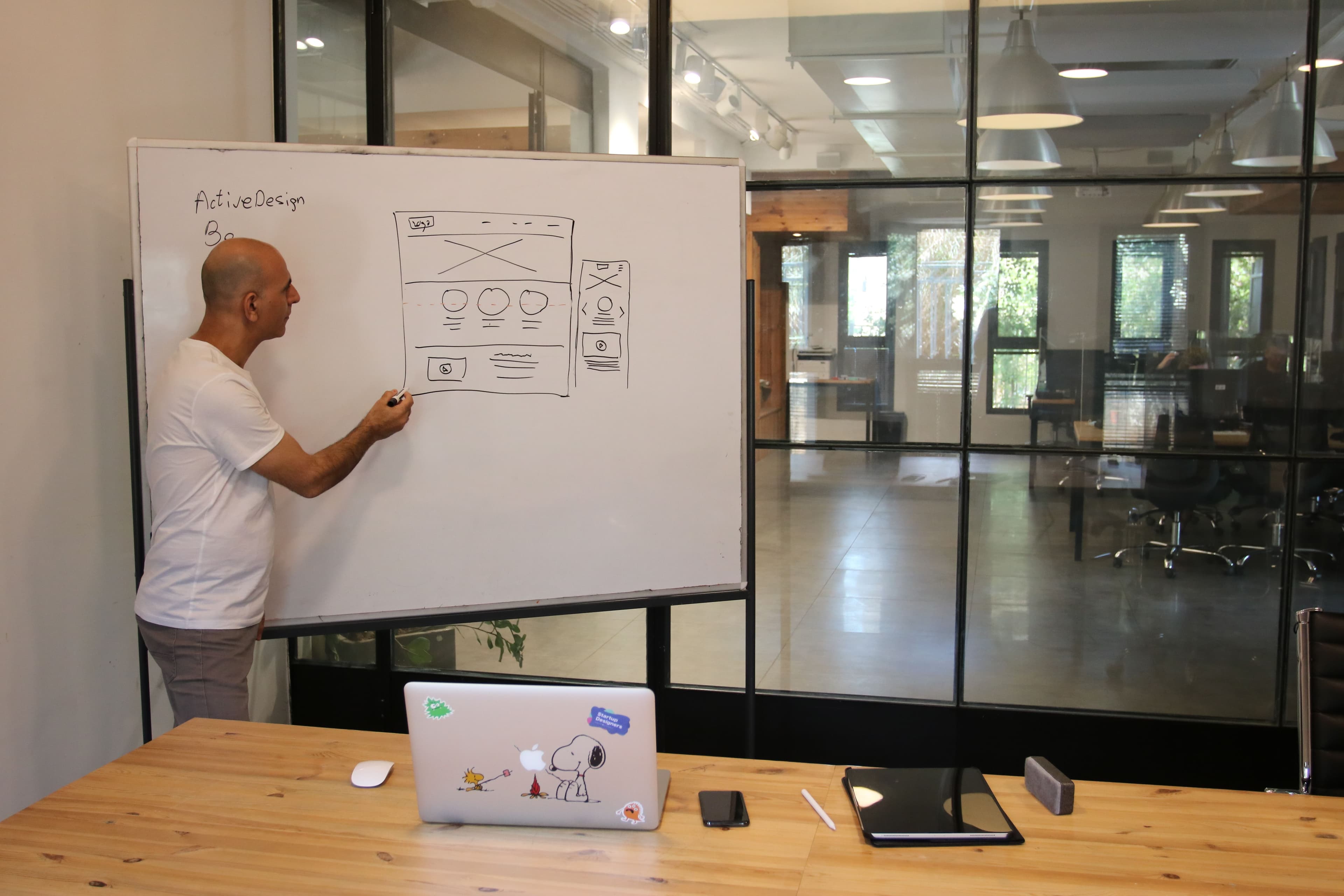 Planning a build out on a whiteboard.