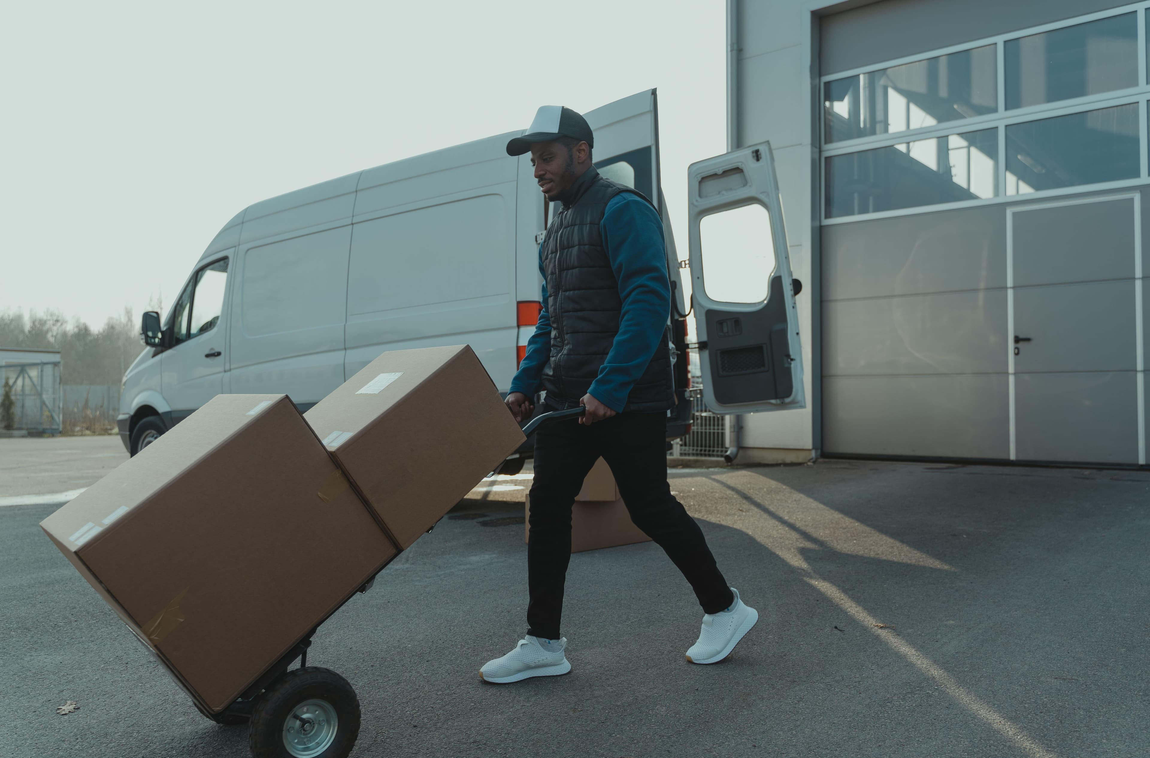 A delivery van being loaded.